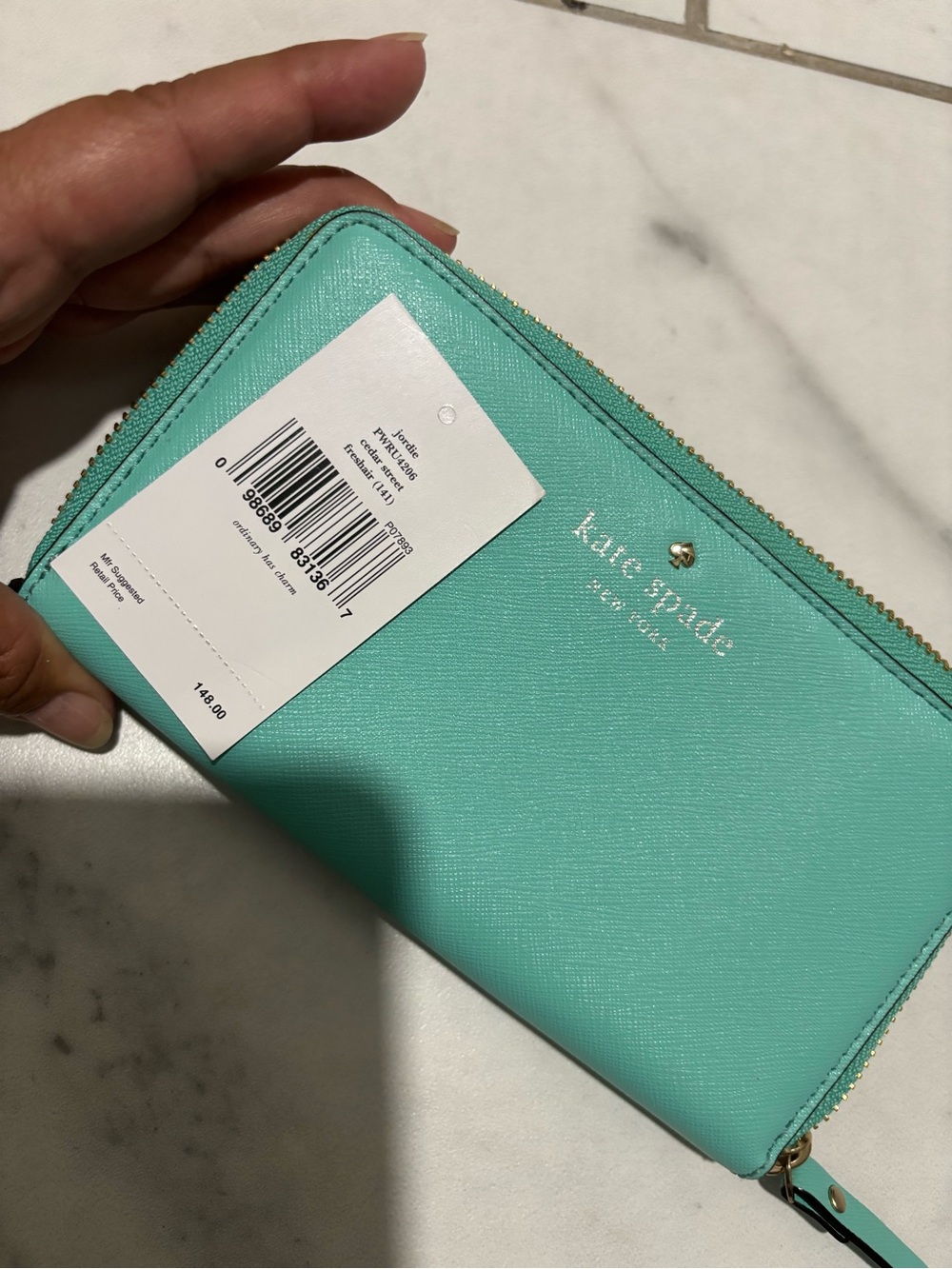 kate spade turquoise zip around wallet with gold hardware